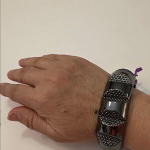 NWT Metallic color in gun metal bracelet
